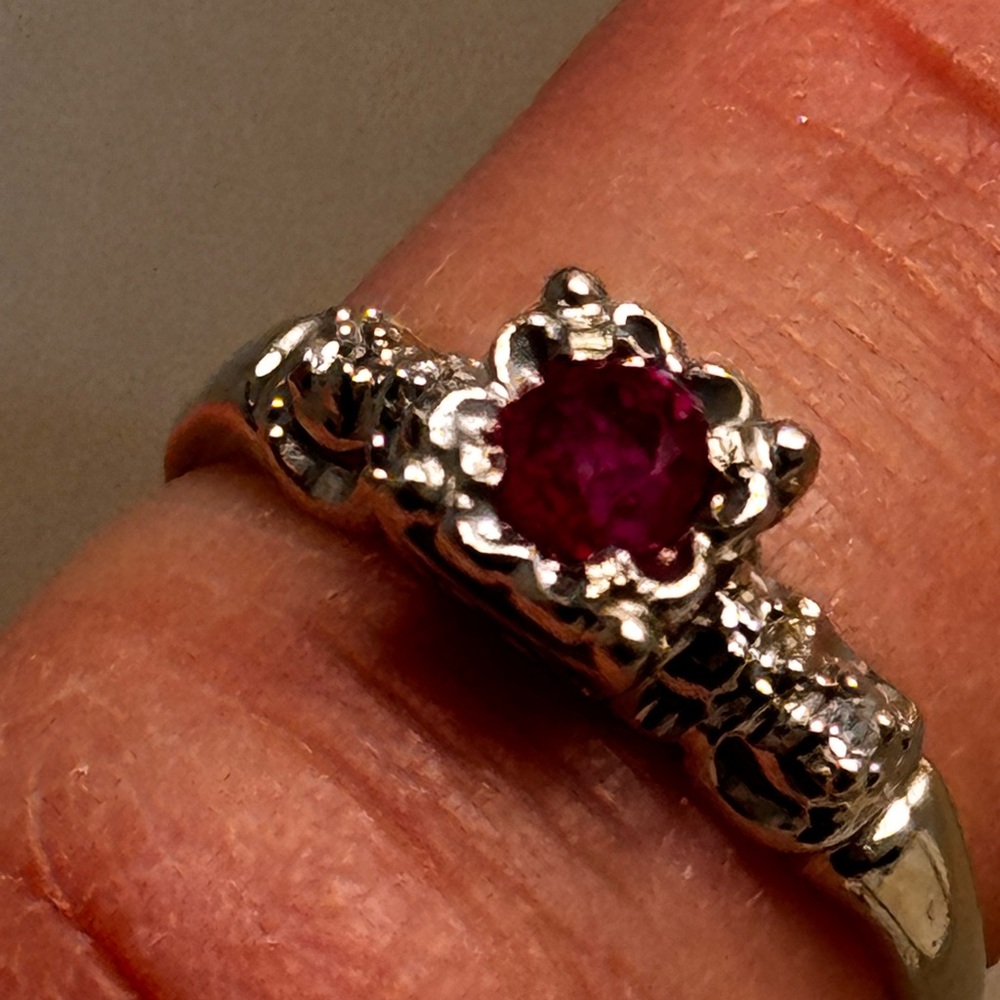 14k white gold Natural untreated Ruby diamond accents 
Offers accepted Rare